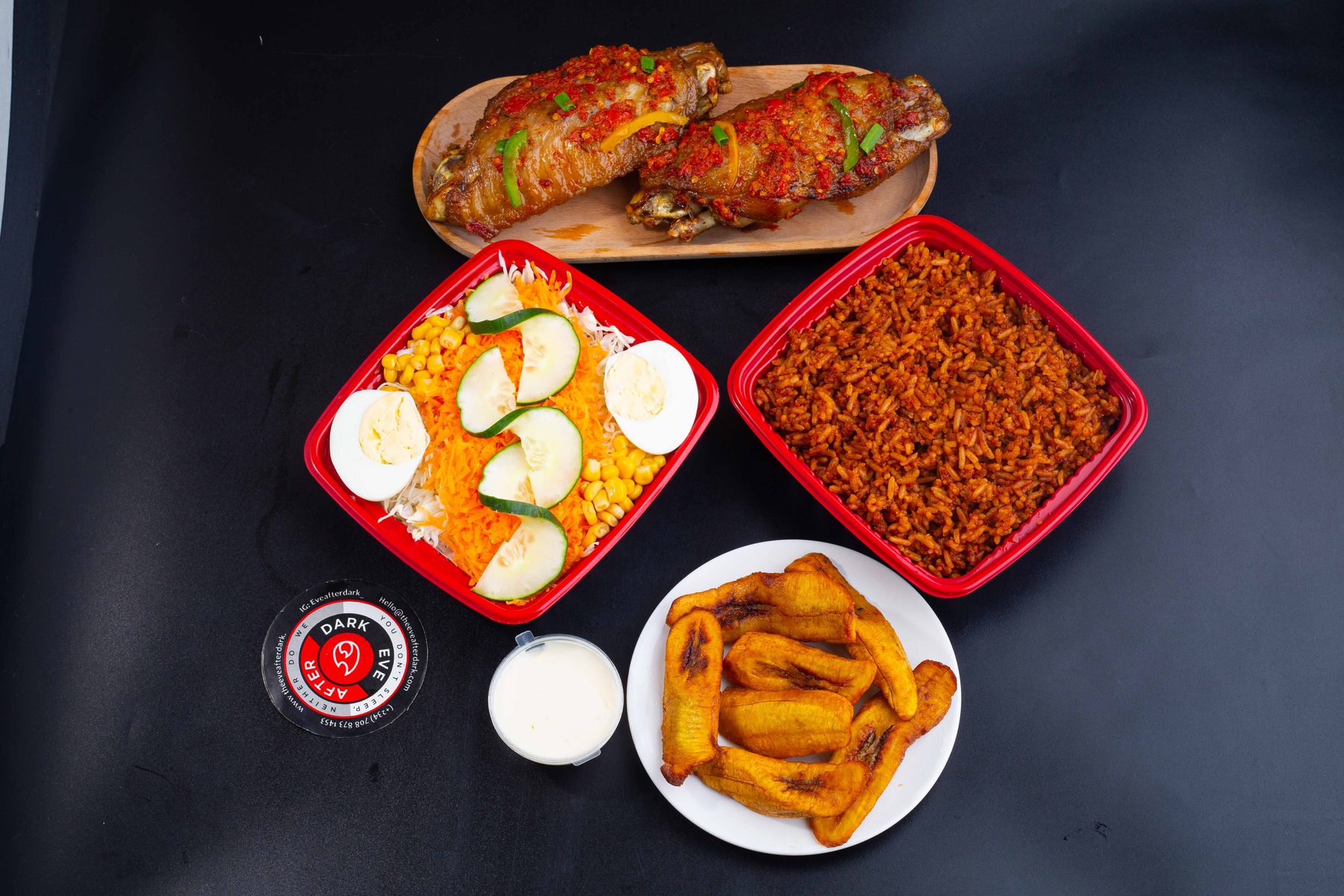 Smoky jollof rice combo with fried plantain, coleslaw and peppered turkey – Nigerian food in Dalston, London
